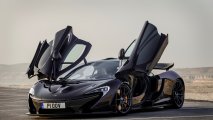 McLaren P1 front side view open gullwing doors